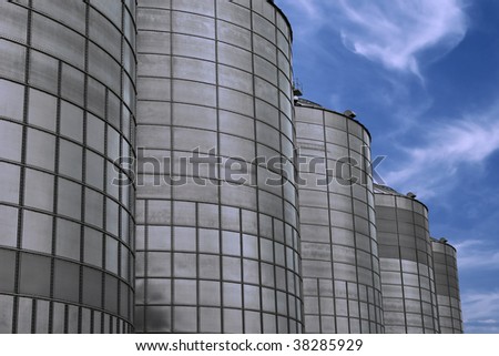 Five, made of steel, storage tanks in a ethanol factory