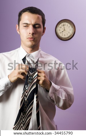 Man in business attire standing near wall clock Ã¢Â?Â? he is too late !