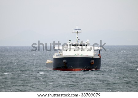 Tug boat - symbol and metaphor of power and pressing