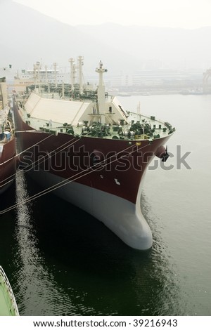 LNG carrier ship designed for transporting natural gas anchored