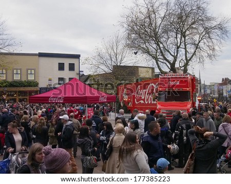 PRESTON, LANCASHIRE, UK. 24th November 2013. Preston crowds visit the Coca-Cola Christmas truck on the 2nd day of its month long UK tour.