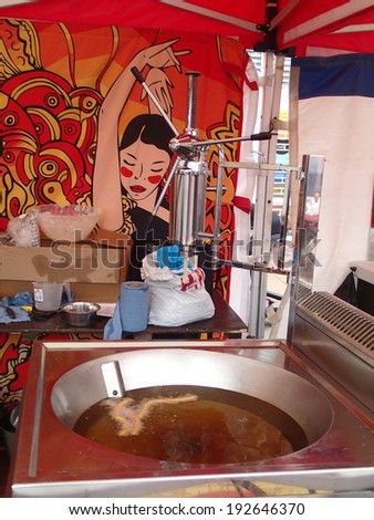 Chorley, Lancashire, UK. 11th May 2014. Cooking Spanish Churro at the first ever food festival to be held in Chorley.