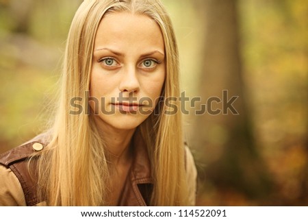 portrait of a beautiful girl with a neutral facial expression, no emotion