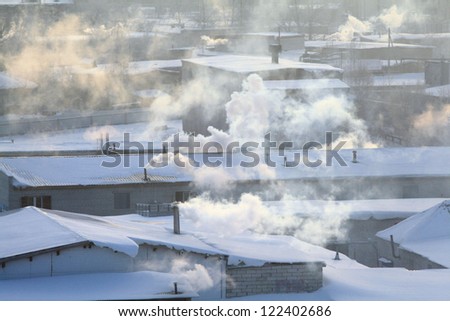 cold day in the city, the smoke from the chimneys, global cooling