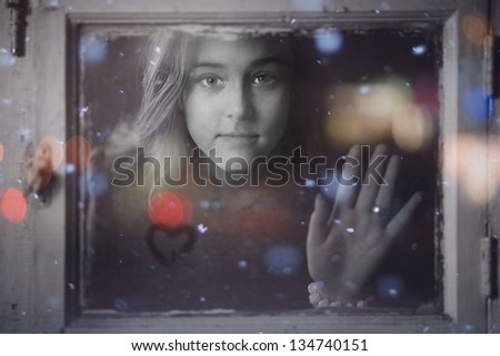 portrait of a girl outside the window