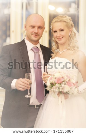 portrait of the bride and groom at a wedding in a beautiful house