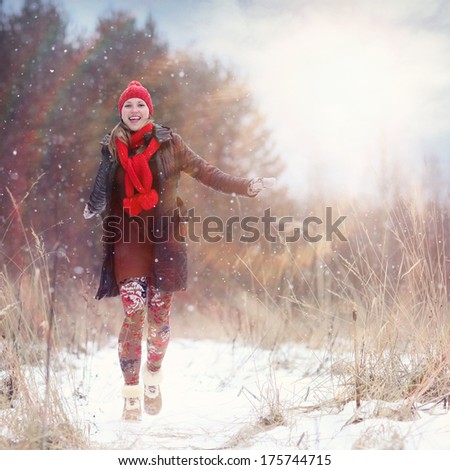 happy girl winter snow runs