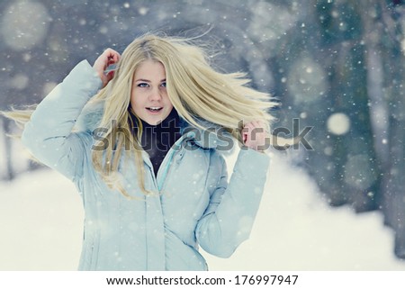 Winter fitness snowballs woman portrait