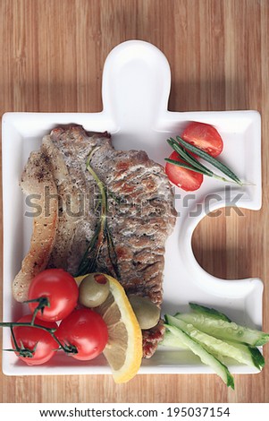 meat in an unusual serving plate