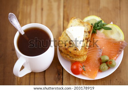 Breakfast tea sandwich with salmon