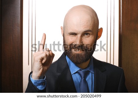businessman victory gesture portrait