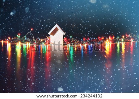 Christmas background, garland lights toys snowflakes snow glare night