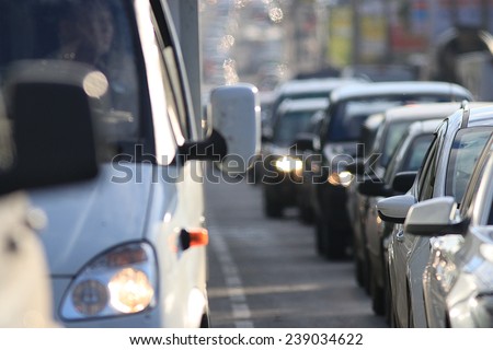 traffic on the road in a European city, stopping vehicular traffic, stop cars