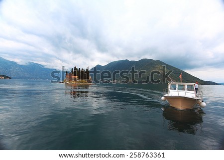 Kotor, Montenegro - JUNE 16: people on the excursion boat, yacht in the Bay of Kotoron June 16, 2014, in Kotor, Montenegro