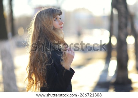 modest shy girl portrait on Spring Street