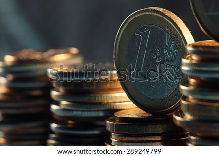 stacks of coins concept dollars euro dollar exchange rate economics