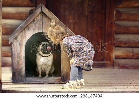 girl and small dog, dog house