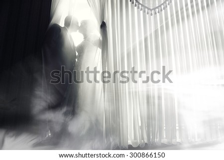 bride and groom wedding black and white portrait indoors