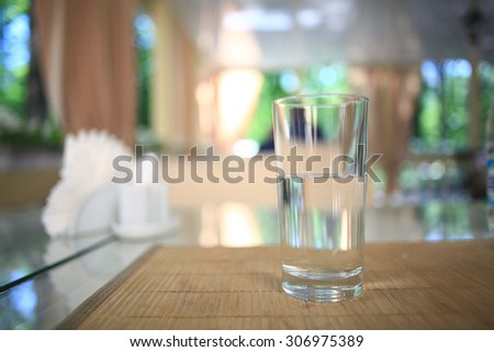 glass of water on a table in a restaurant