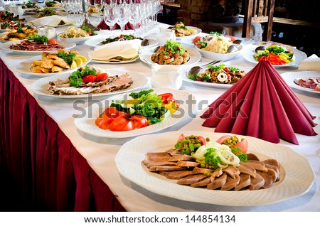 Delicious Buffet Table At A Luxury Event Spread With A Variety Of Cold Meat Platters And Fresh Colorful Salad And Vegetables