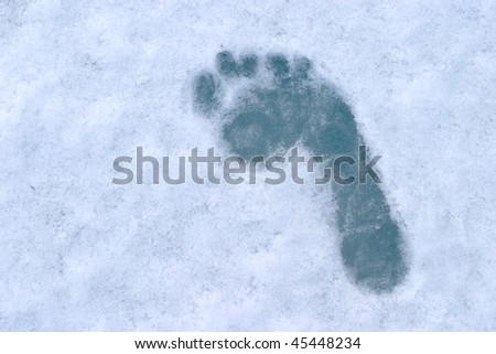 human footprint on blue ice