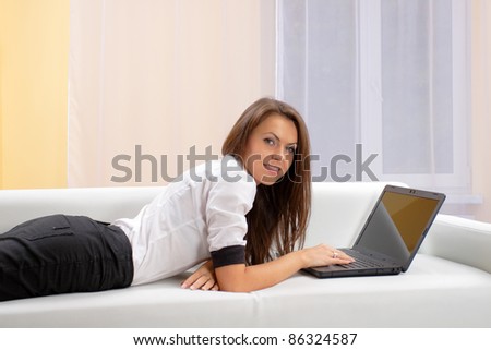young woman with laptop. smiling face
