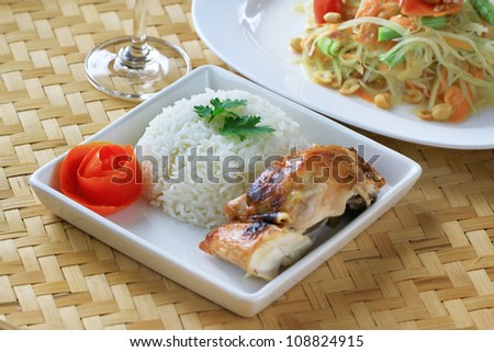 Chicken rice on bamboo floor