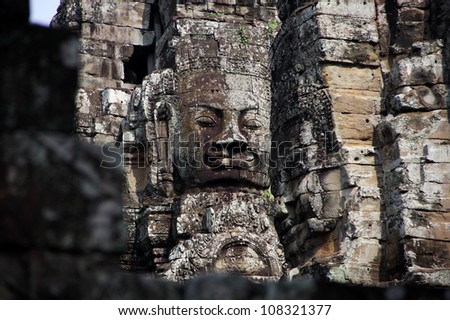 ANGKOR THOM, CAMBODIA- JUNE 3, 2012: Face of Bayon built in the late 12th century or early 13th at Siam Reap, Cambodia. June 3 2012