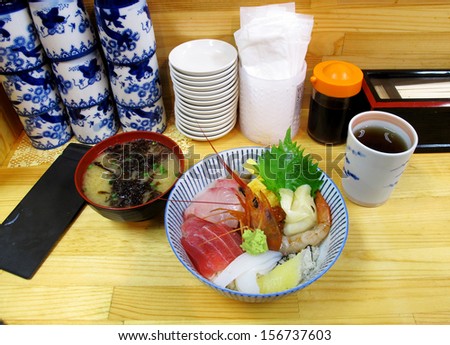 Kaisen don consists of assorted raw seafood on a bowl of sushi rice, or combination of salmon, tuna, shrimp, and squid.