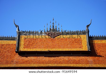 Gable apex on the roof of temple in UNESCO world heritage town, Laos.