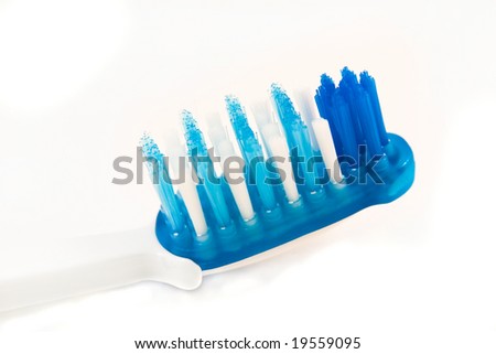 Close up tooth-brush on a white background.