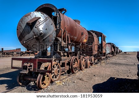 Abandoned, old, rusted steam locomotive and wagons, Cemetery of trains, Uyuni, Bolivia.