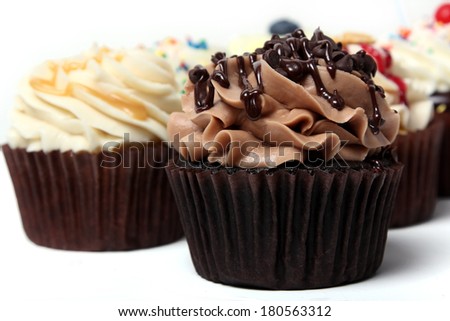 Multiple cupcakes on white background