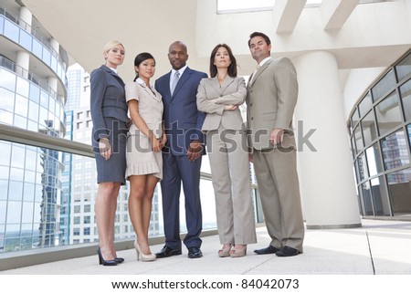 Interracial group of business men & women, businessmen and businesswomen team