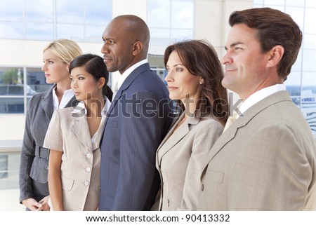 Interracial group of business men & women, businessmen and businesswomen team