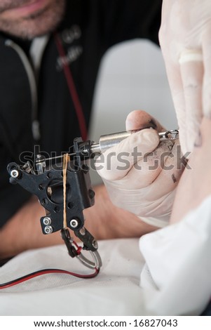 Tattoo artist at work