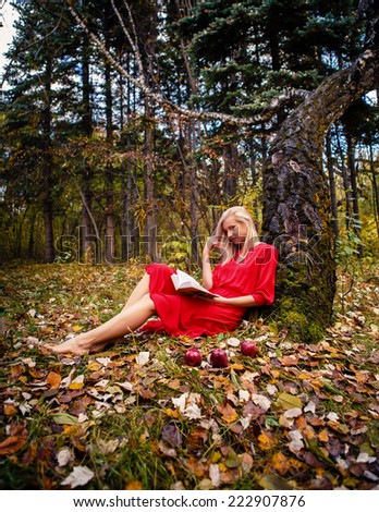 Girl fall  park leaves trees,book, apple