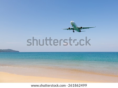Phuket,Thailand -  February 23, 2015: beach near the airport, planes come in the land