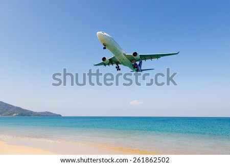 Phuket,Thailand -  February 23, 2015: beach near the airport, planes come in the land