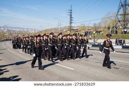 Krasnoyarsk, Russia - May 9, 2014: Soldiers march the street during celebrations of the \