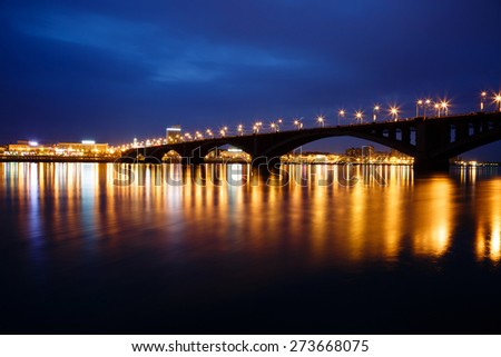 Krasnoyarsk, Russia - May 9, 2014: the bridge through the river Yenisei, a night view of the city of Krasnoyarsk