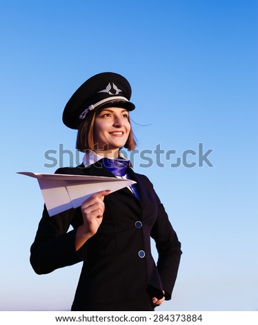 The young beautiful woman in the form of the stewardess, soft focus