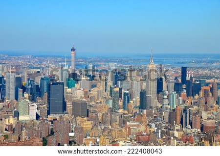 NEW YORK CITY - SEPTEMBER 28, 2014: Manhattan Skyline with Empire State Building on September 28, 2014, New York City, USA.