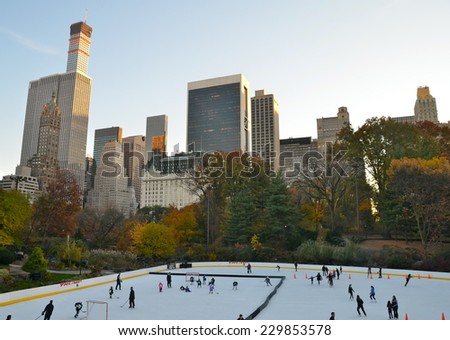 NEW YORK CITY - NOVEMBER 10, 2014: Ice-skating people in Central Park on November 10, 2014 in Manhattan, New York City, USA.