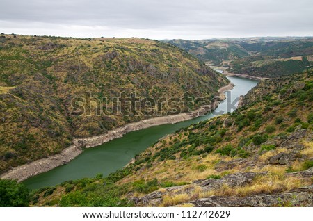 Douro river amidst cliffs. Sendim, Spain and Portugal border.
