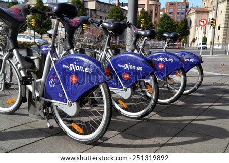GIJON, SPAIN - OCTOBER 23: Some bicycles of the bike rental service in Gijon, Spain on October 23, 2014. Gijon Bici is a bike sharing service that people can rent bicycles for short trips.