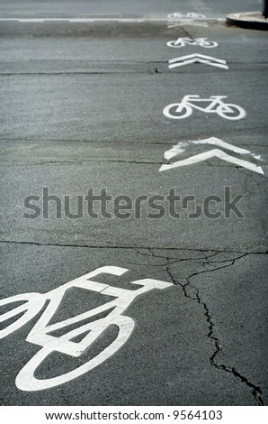 Environmentally friendly transport.  Cycle lane with painted bicycles.