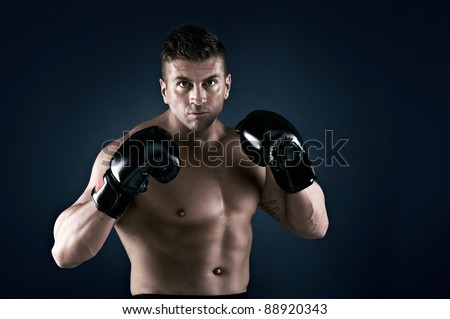Muscle man, lots of muscles, working out, loving life. Very well built, very attractive. Boxing, Boxing Ball.