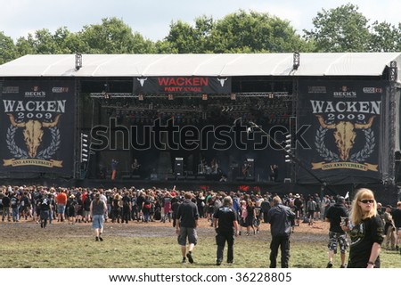 SCHLESWIG-HOLSTEIN, GERMANY - JULY 31: Crowd of people at Wacken Open Air, world\'s largest open air heavy metal music festival on July 31st, 2009, in Schleswig-Holstein, Germany
