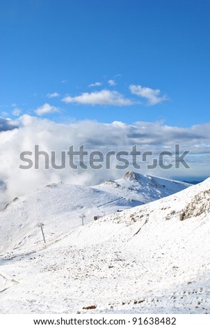 Heavy snow fall over the tall mountains